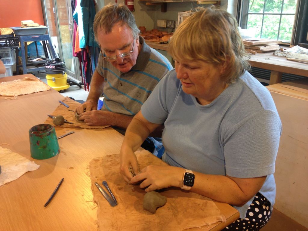 Two of our Seekers try their hand at modelling clay